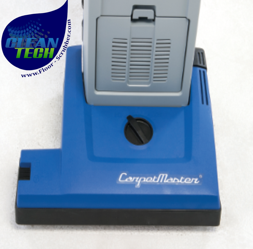 A close-up of a carpet cleaner head attachment with a blue base, gray upper section, and black trim, shown on a white background. The brand name 'CarpetMaster' is printed on the blue base, and a 'Clean Tech' watermark is visible in the top-left corner.