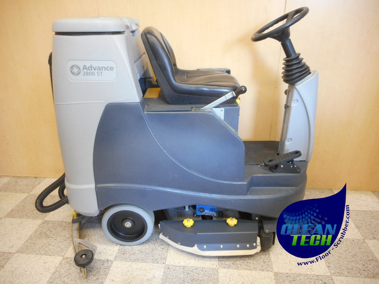 Side view of a reconditioned Advance Advenger 2800 ST 28-inch dual disk rider floor scrubber.