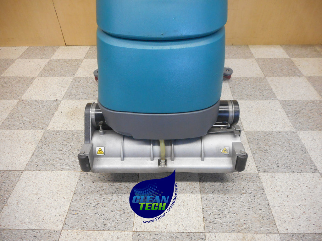 Reconditioned Tennant T5 walk-behind floor scrubber ready for commercial use