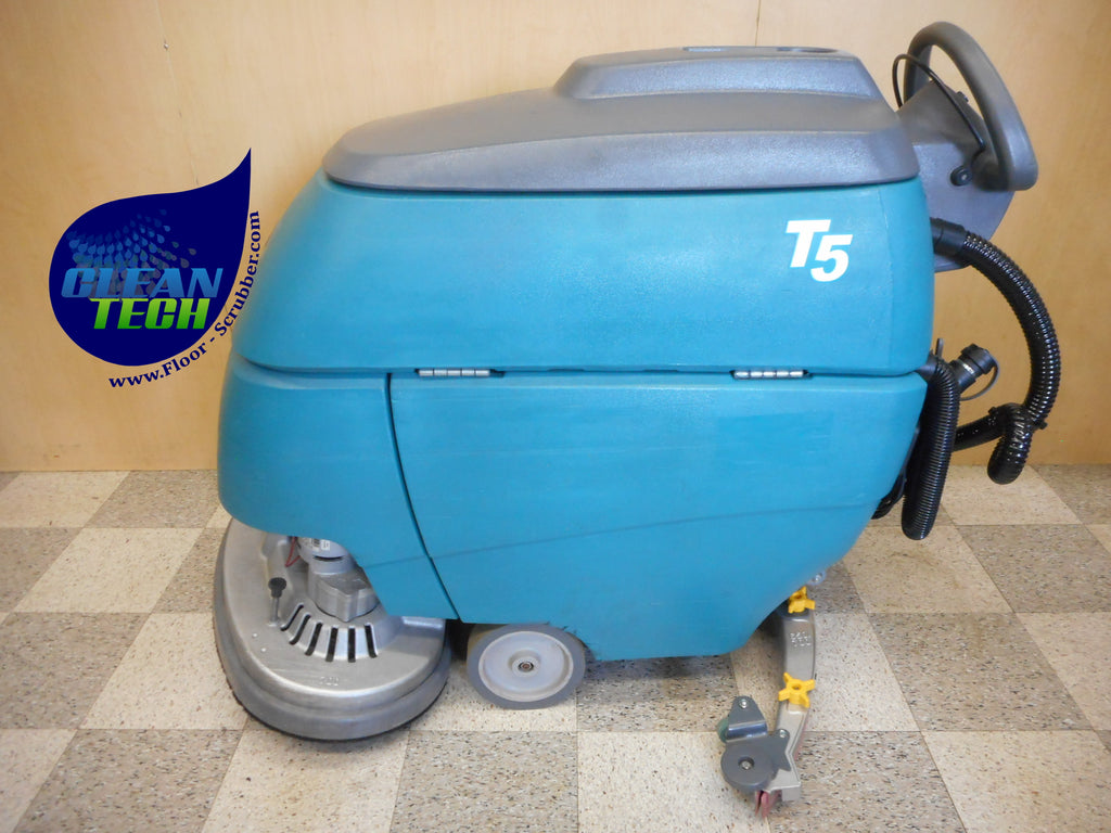 Tennant T5 28-inch auto floor scrubber showing the commercial scrub deck